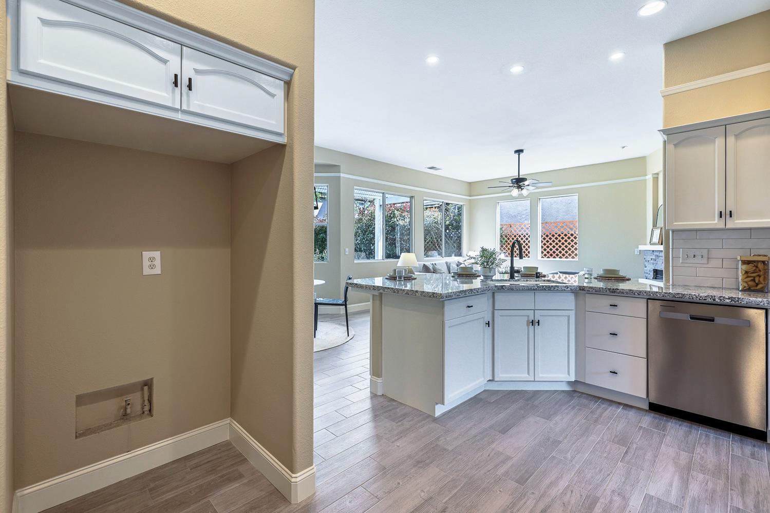 2735 Swift Avenue Clovis, CA 93611 - Photo 14 of 30 a kitchen with white cabinets and sink