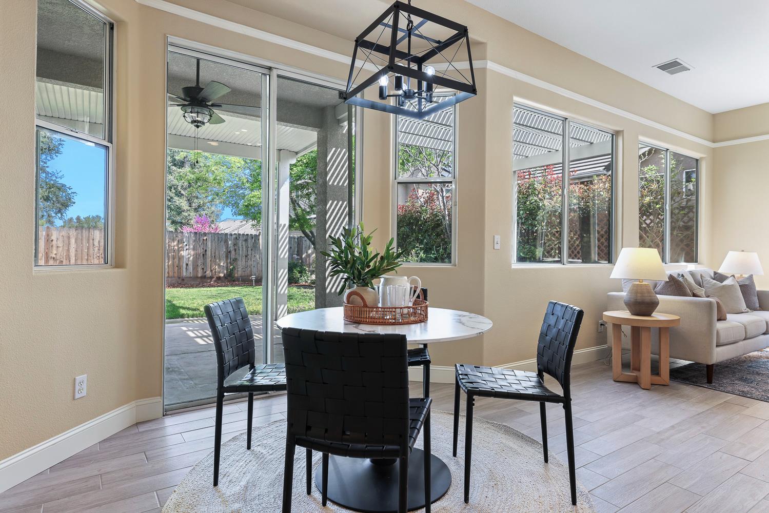 2735 Swift Avenue Clovis, CA 93611 - Photo 16 of 30 a view of a dining room with furniture window and outside view