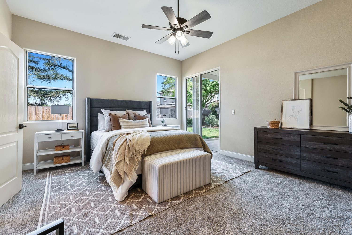 2735 Swift Avenue Clovis, CA 93611 - Photo 18 of 30 a bedroom with a bed and a window