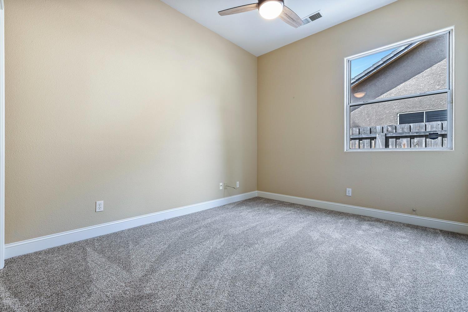 2735 Swift Avenue Clovis, CA 93611 - Photo 22 of 30 a view of an empty room with a window