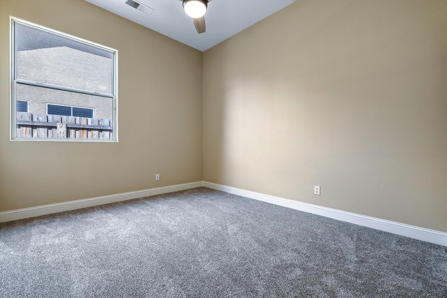 2735 Swift Avenue Clovis, CA 93611 - Photo 24 of 30 an empty room with a window