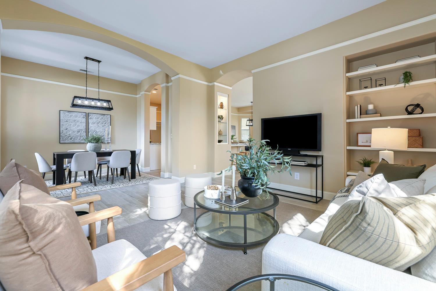 2735 Swift Avenue Clovis, CA 93611 - Photo 7 of 30 a living room with furniture and a flat screen tv
