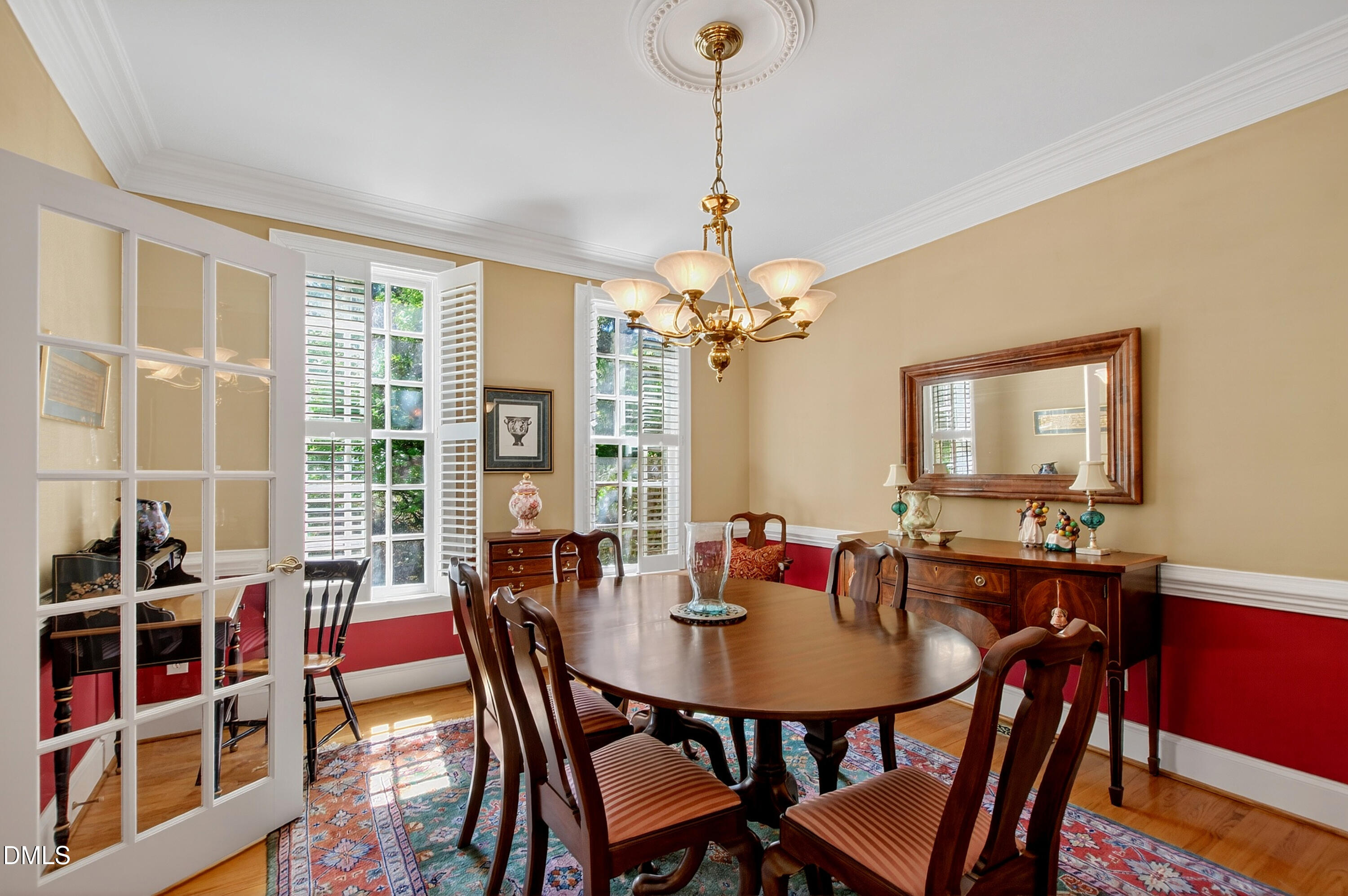 3708 Lubbock Drive Raleigh, NC 27612 - Photo 9 of 64 a view of a dining room with furniture and a window
