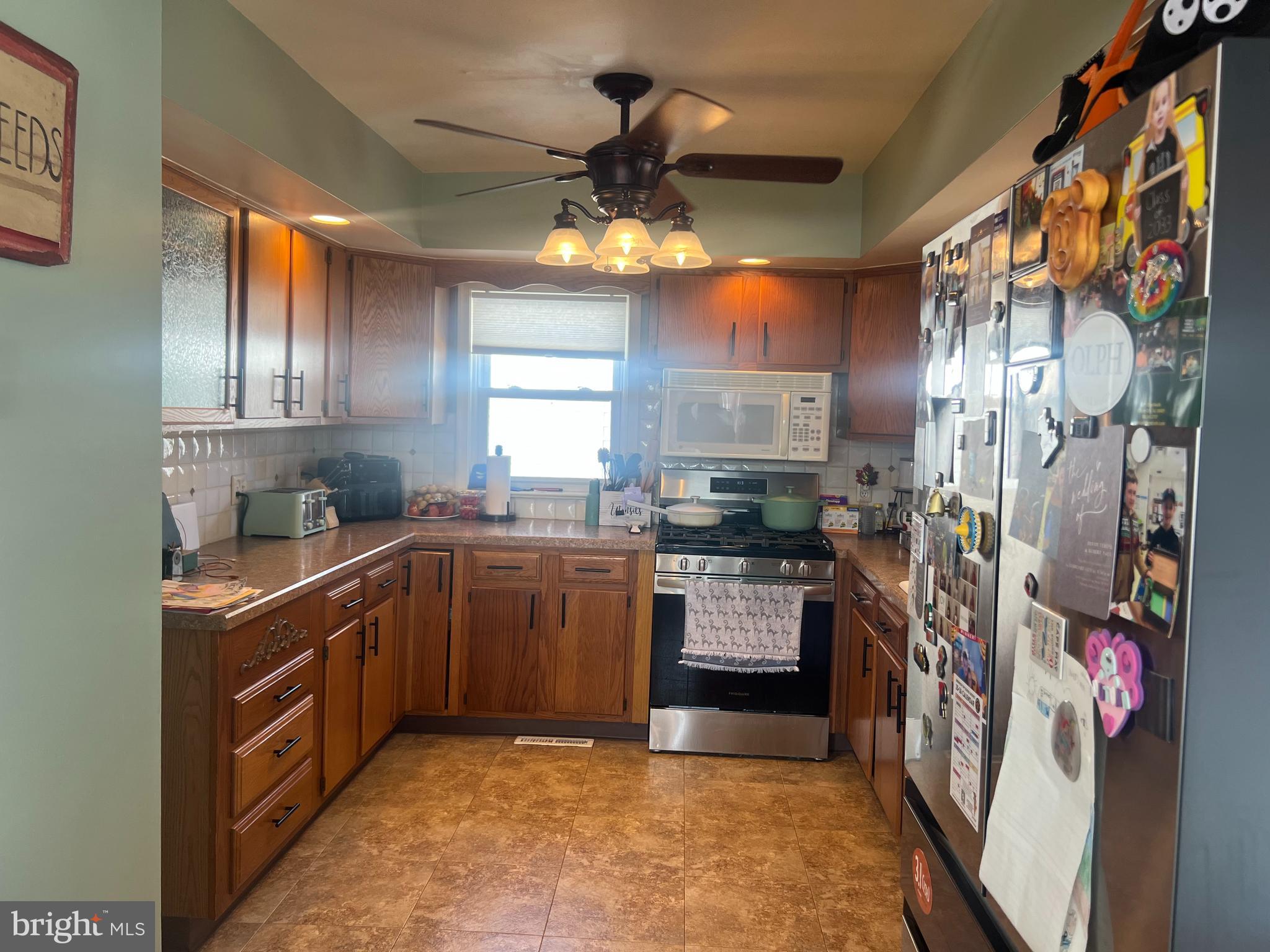 47 South Lippincott Avenue Maple Shade, NJ 08052 - Photo 12 of 24 a kitchen with stainless steel appliances granite countertop a sink and cabinets