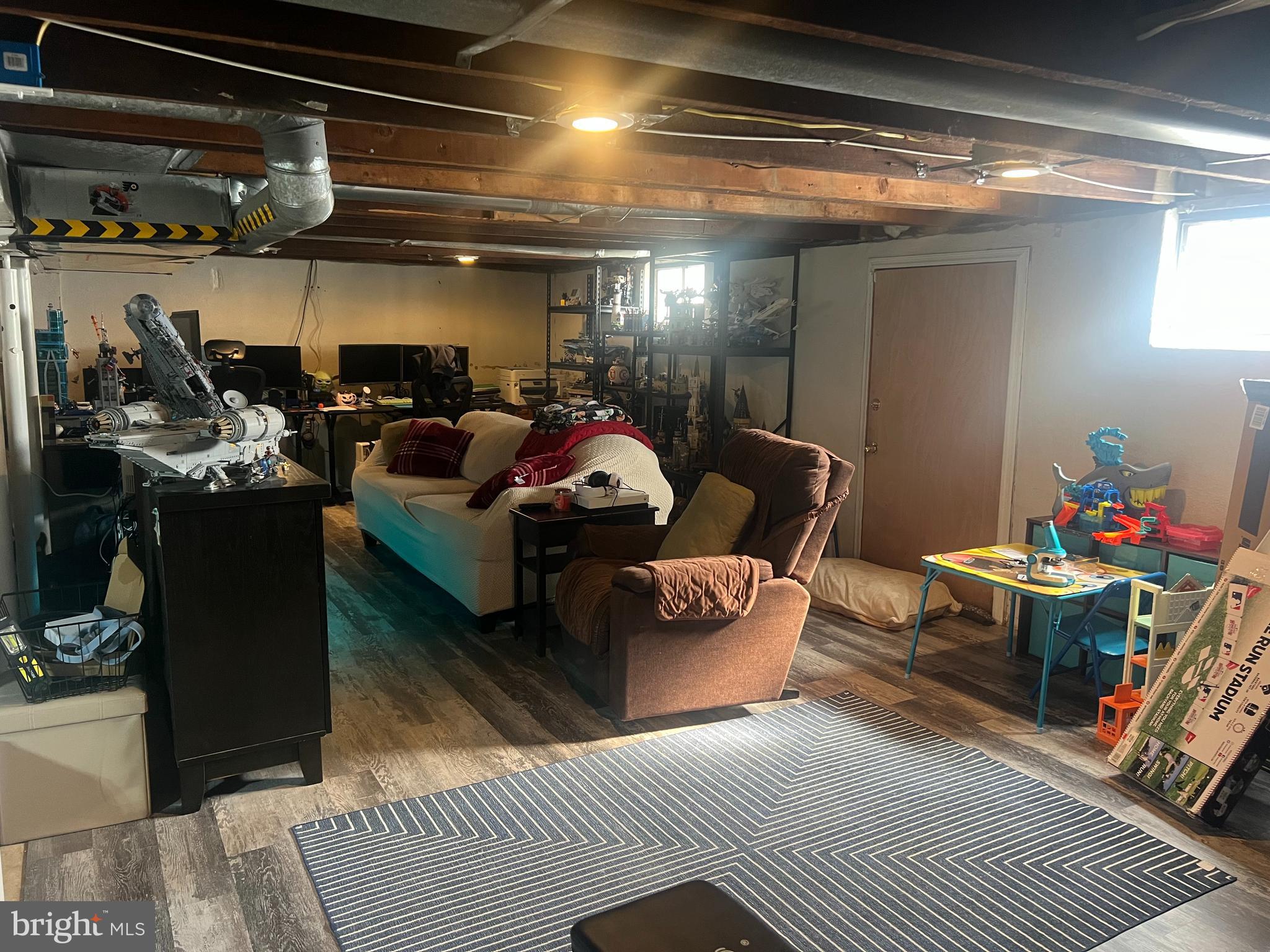 47 South Lippincott Avenue Maple Shade, NJ 08052 - Photo 19 of 24 a living room with lots of furniture and clutter