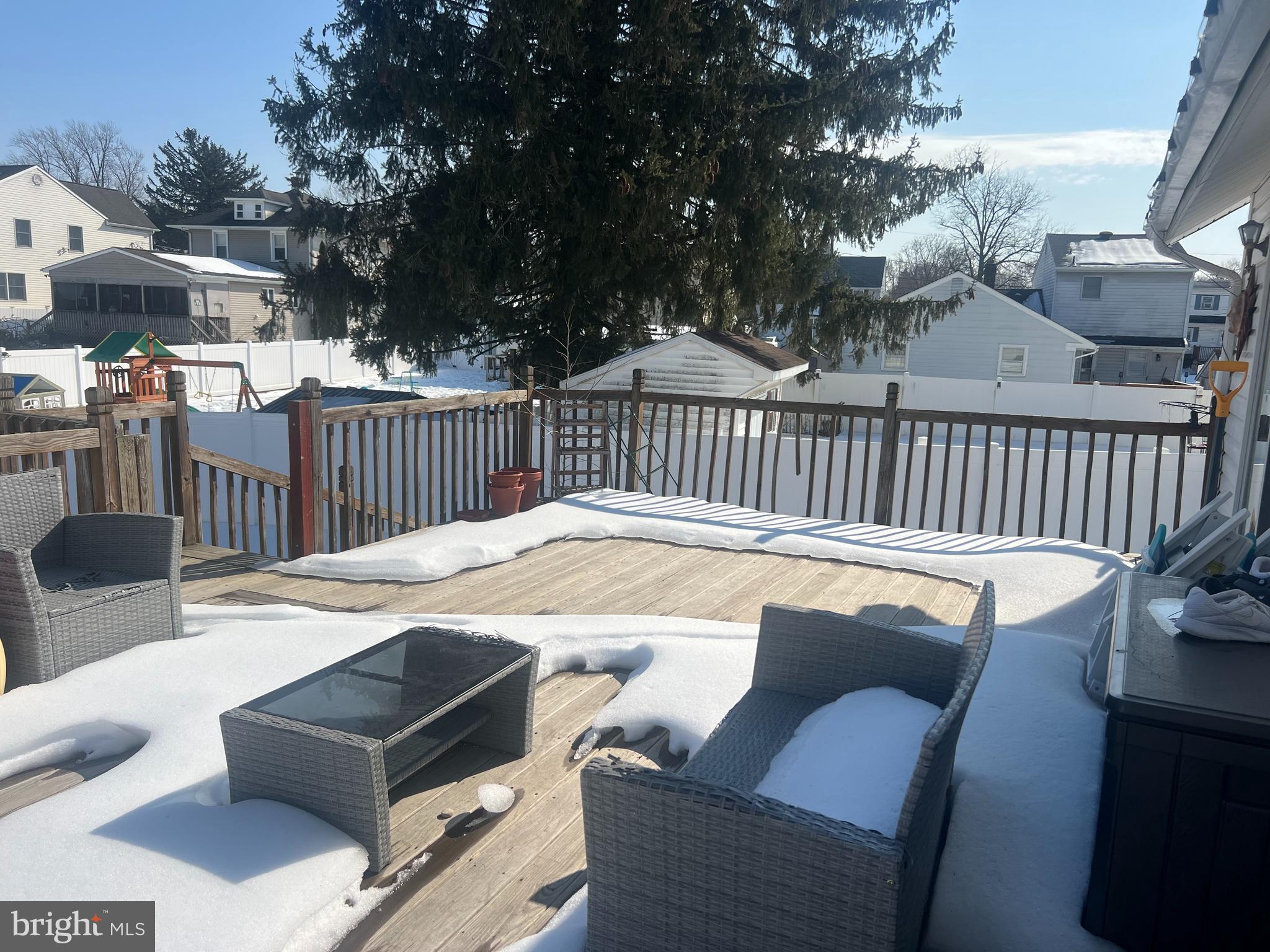 47 South Lippincott Avenue Maple Shade, NJ 08052 - Photo 22 of 24 a roof deck with couches and wooden fence