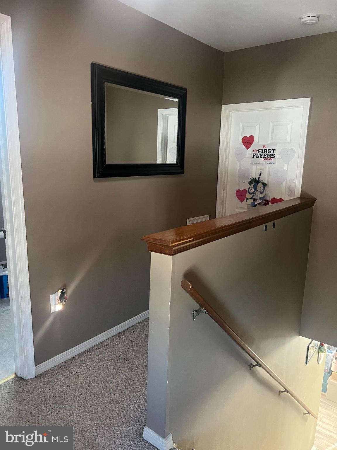 47 South Lippincott Avenue Maple Shade, NJ 08052 - Photo 3 of 24 a room with painting on the wall and a potted plant
