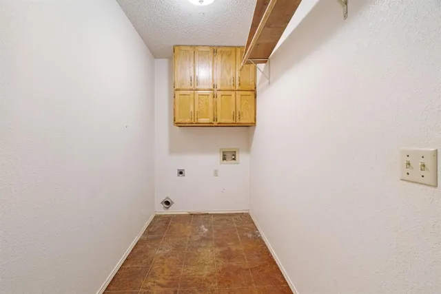 a view of hallway with windows