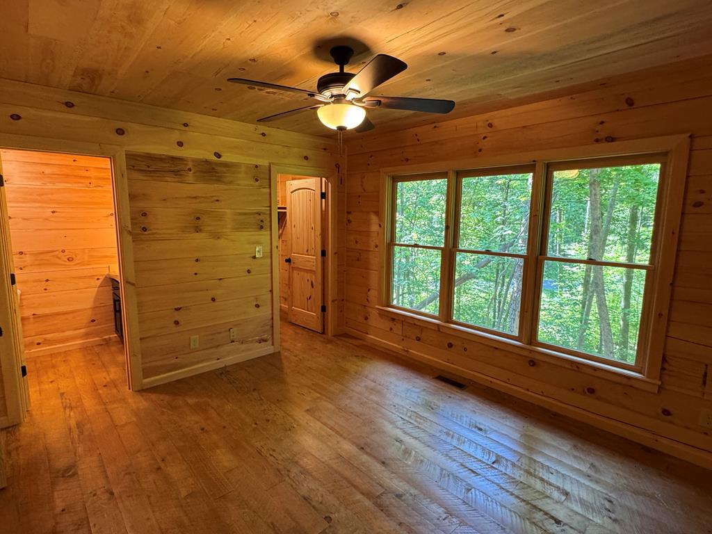 639 North Moreland Drive Blue Ridge, GA 30513 - Photo 51 of 53 a view of empty room with wooden floor and fan