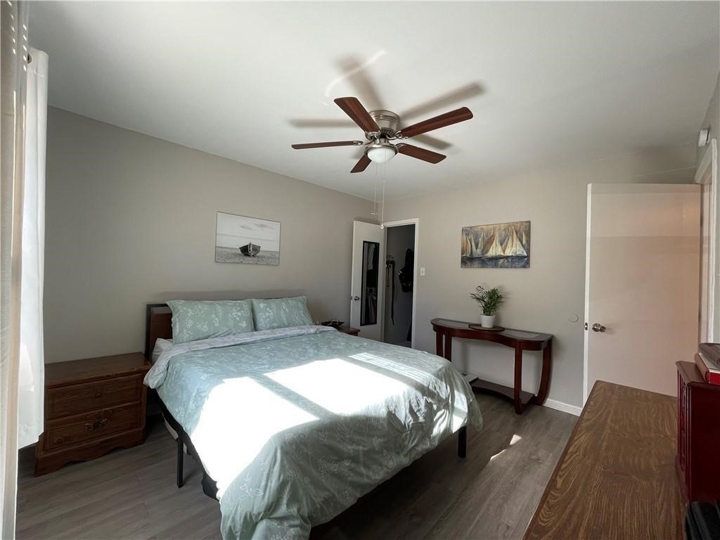 4302 Lake Road, Unit 4 Killeen, TX 76543 - Photo 8 of 9 Bedroom with ceiling fan and hardwood / wood-style floors