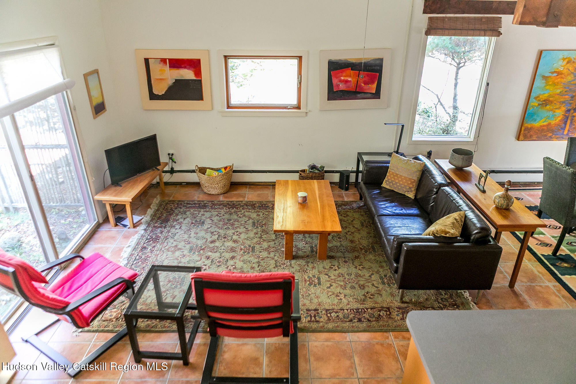 60 Phillips Road Saugerties, NY 12477 - Photo 14 of 23 a living room with furniture a flat screen tv and a window