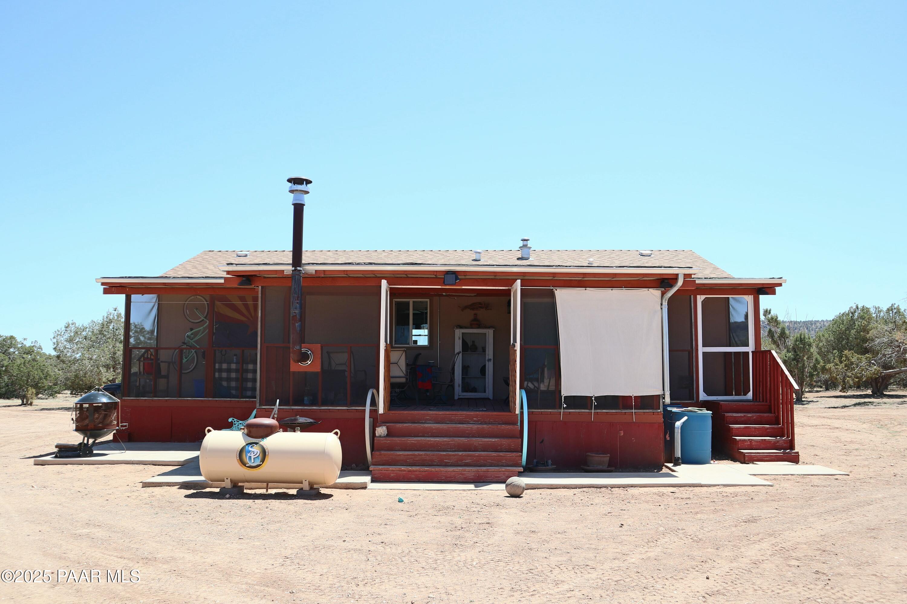 8850 West Fountain Ranch Road Ash Fork, AZ 86320 - Photo 18 of 29 a view of a car park in front of house
