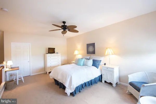 an aerial view of a house with a lake view