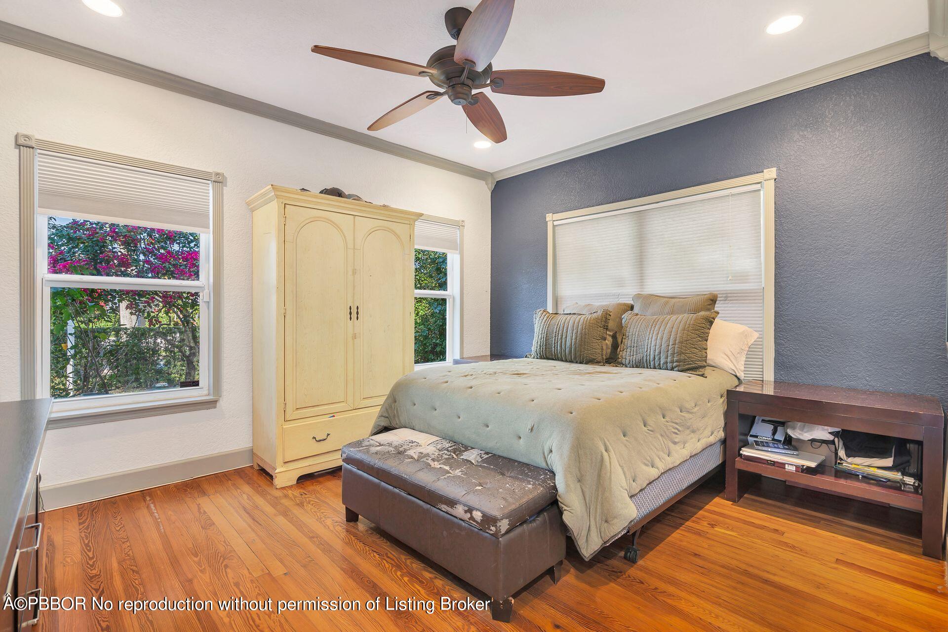 612 Upland Road West Palm Beach, FL 33401 - Photo 13 of 24 a spacious bedroom with a bed and a window