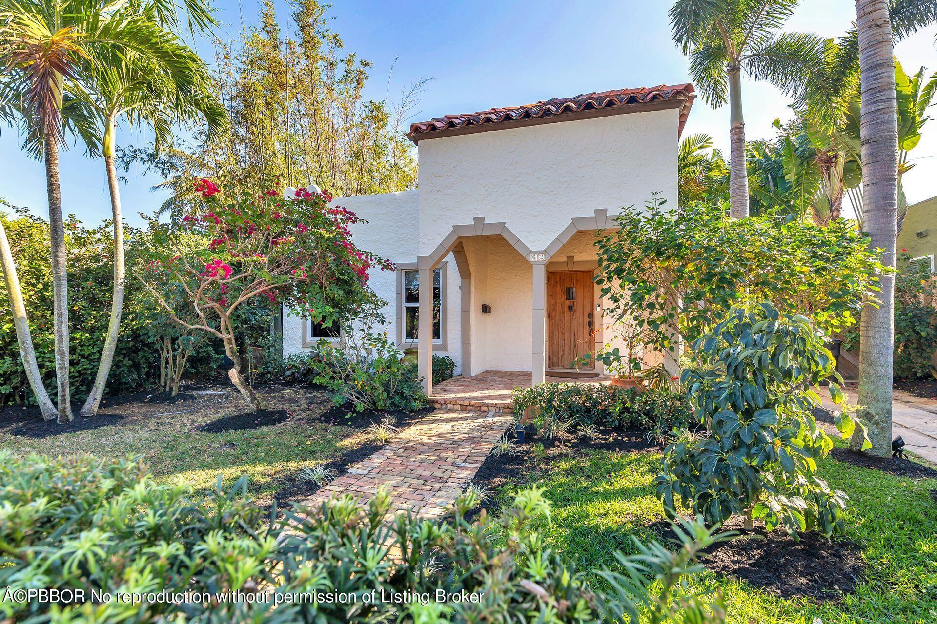 612 Upland Road West Palm Beach, FL 33401 - Photo 2 of 24 a house view with a backyard space