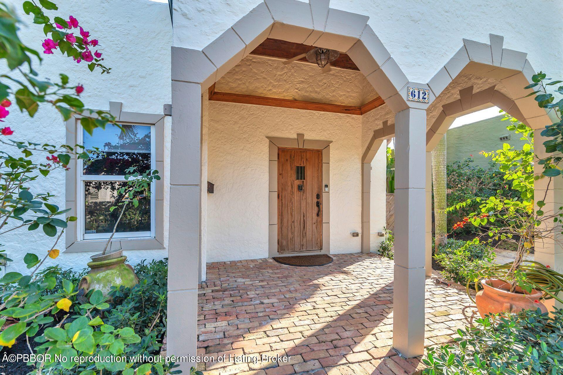 612 Upland Road West Palm Beach, FL 33401 - Photo 3 of 24 a front view of a house