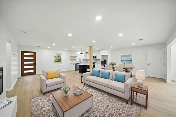 a living room with furniture and a couch