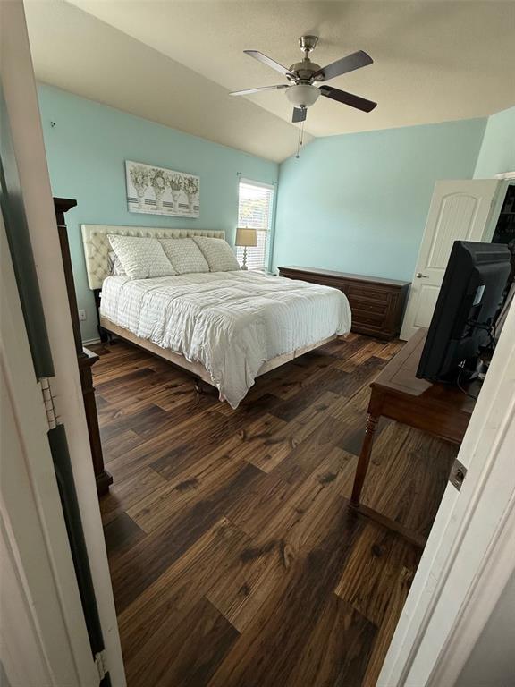 120 Chalk Road Anna, TX 75409 - Photo 14 of 29 a bedroom with a bed and wooden floor