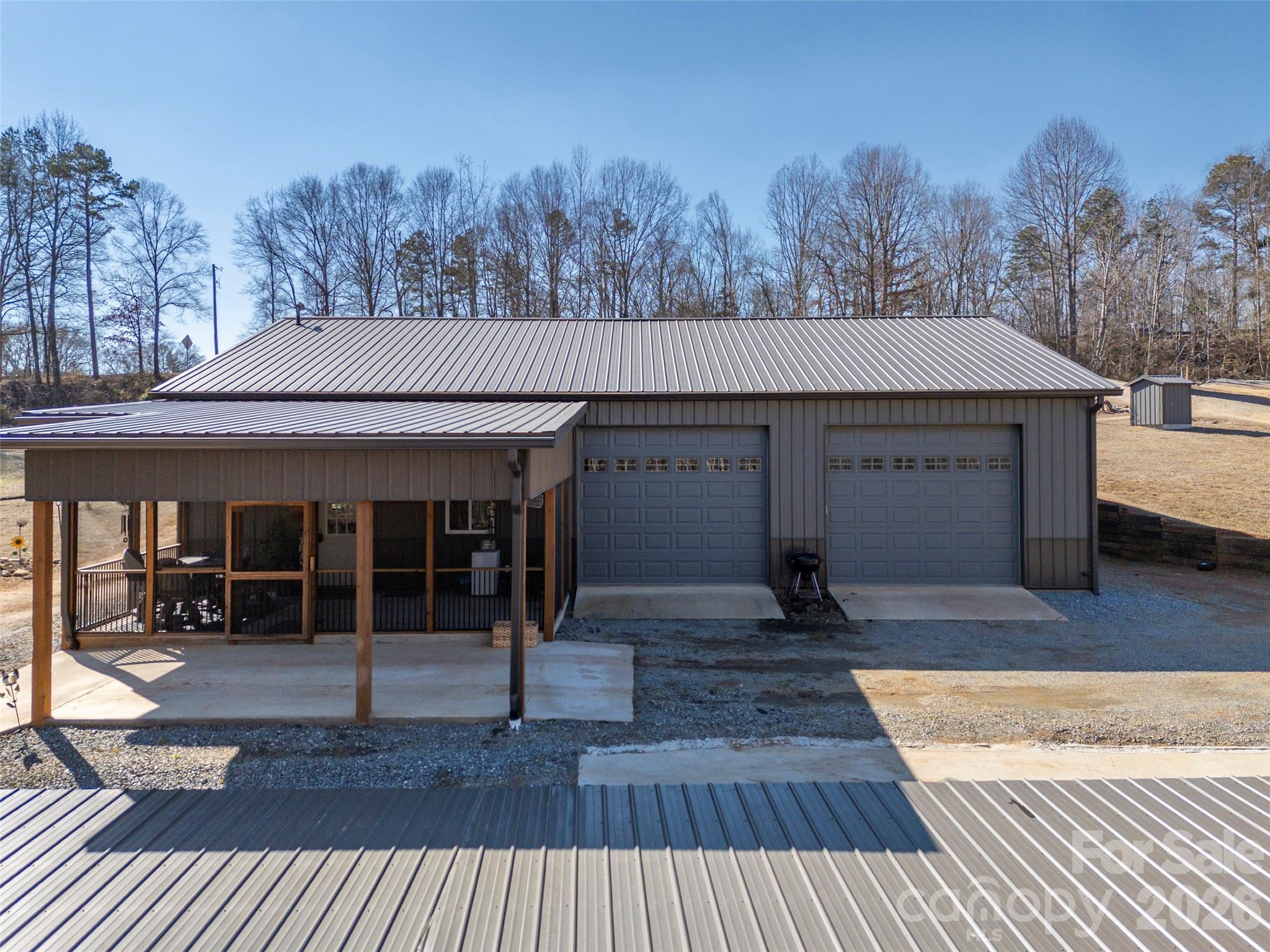 873 Ellenboro Henrietta Road Ellenboro, NC 28040 - Photo 3 of 48 a front view of a house with garden