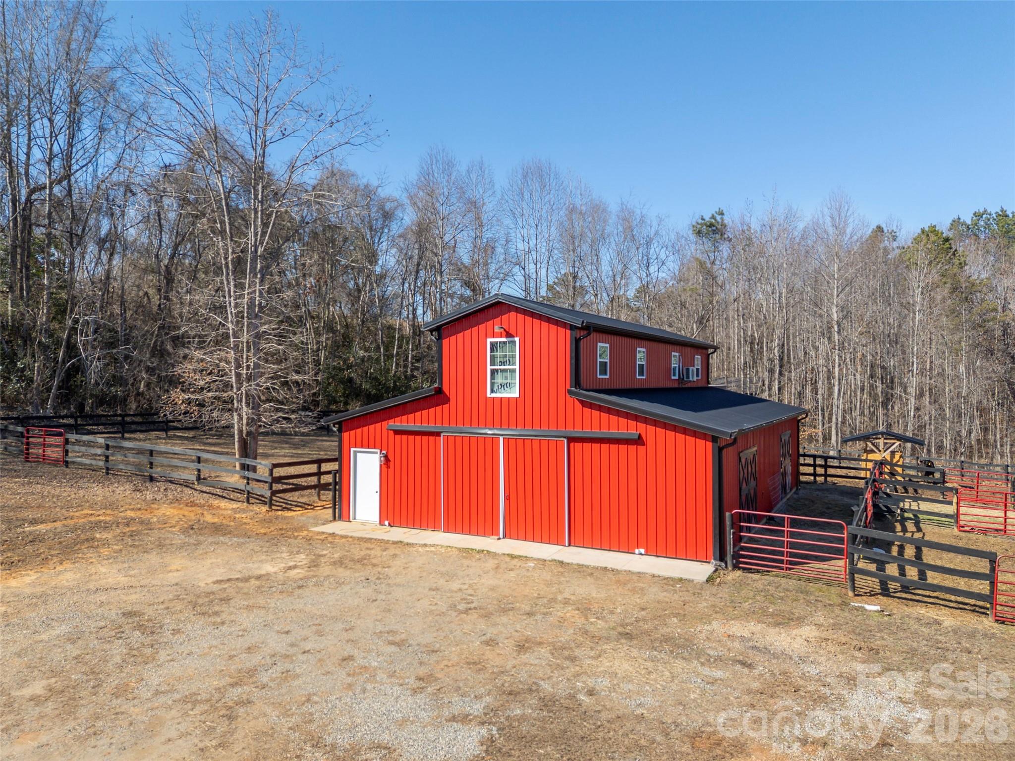 873 Ellenboro Henrietta Road Ellenboro, NC 28040 - Photo 42 of 48 a front view of a house with a yard