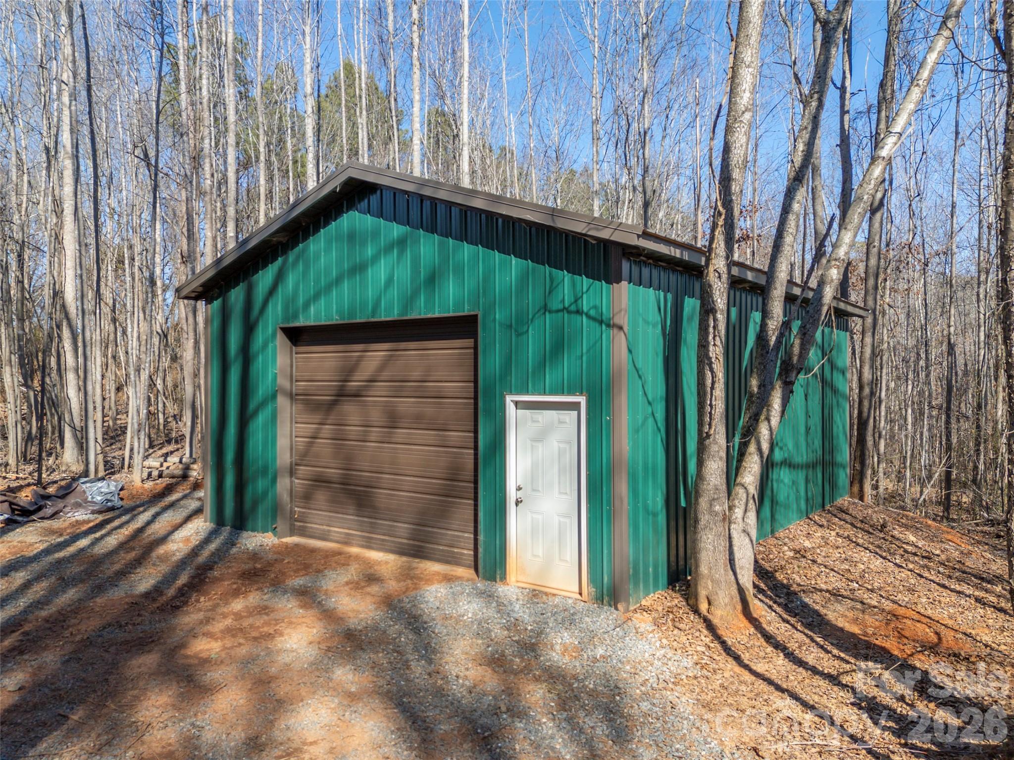 873 Ellenboro Henrietta Road Ellenboro, NC 28040 - Photo 43 of 48 a backyard of a house