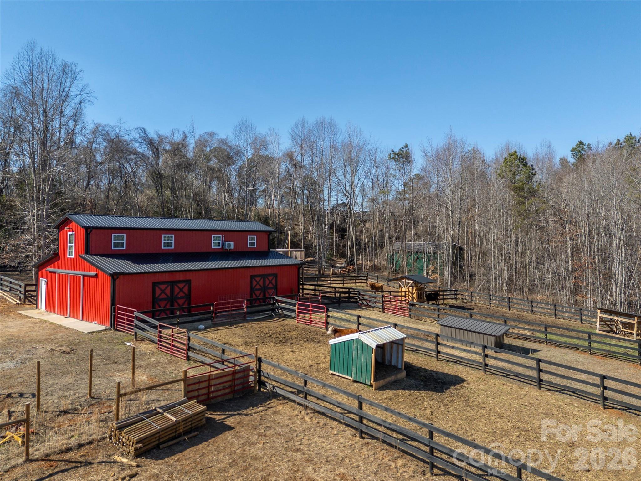 873 Ellenboro Henrietta Road Ellenboro, NC 28040 - Photo 44 of 48 a view of a chairs and tables in the back yard of the house