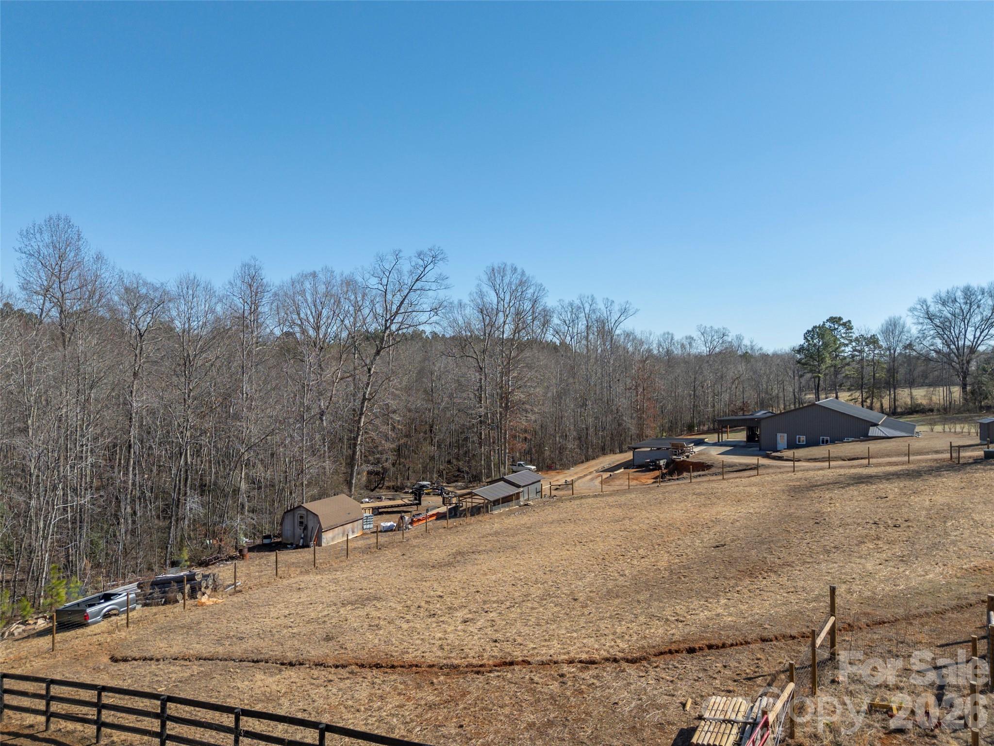 873 Ellenboro Henrietta Road Ellenboro, NC 28040 - Photo 45 of 48 a view of a dry yard with trees