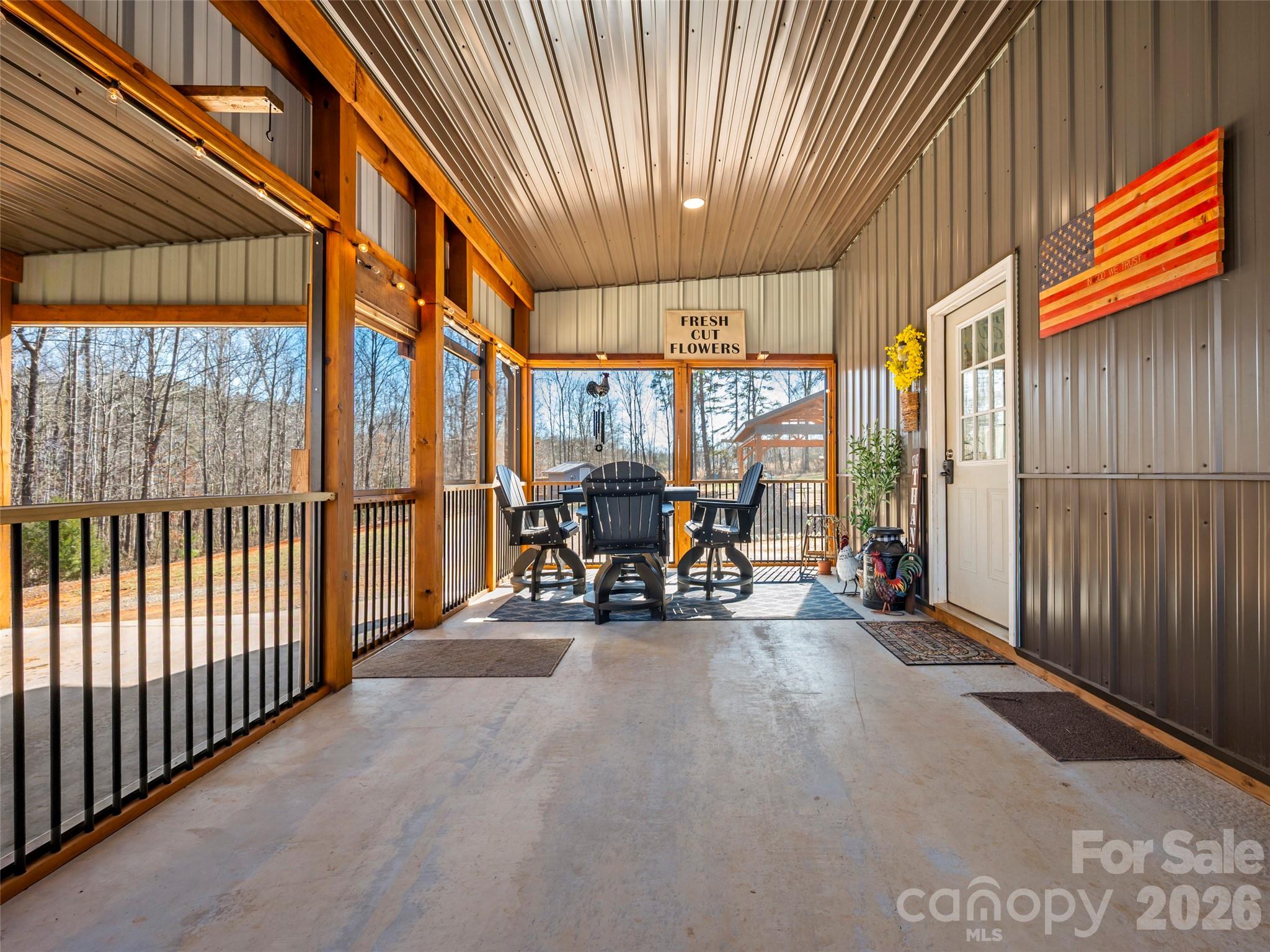 873 Ellenboro Henrietta Road Ellenboro, NC 28040 - Photo 6 of 48 a view of a chairs and table in the back yard of the house