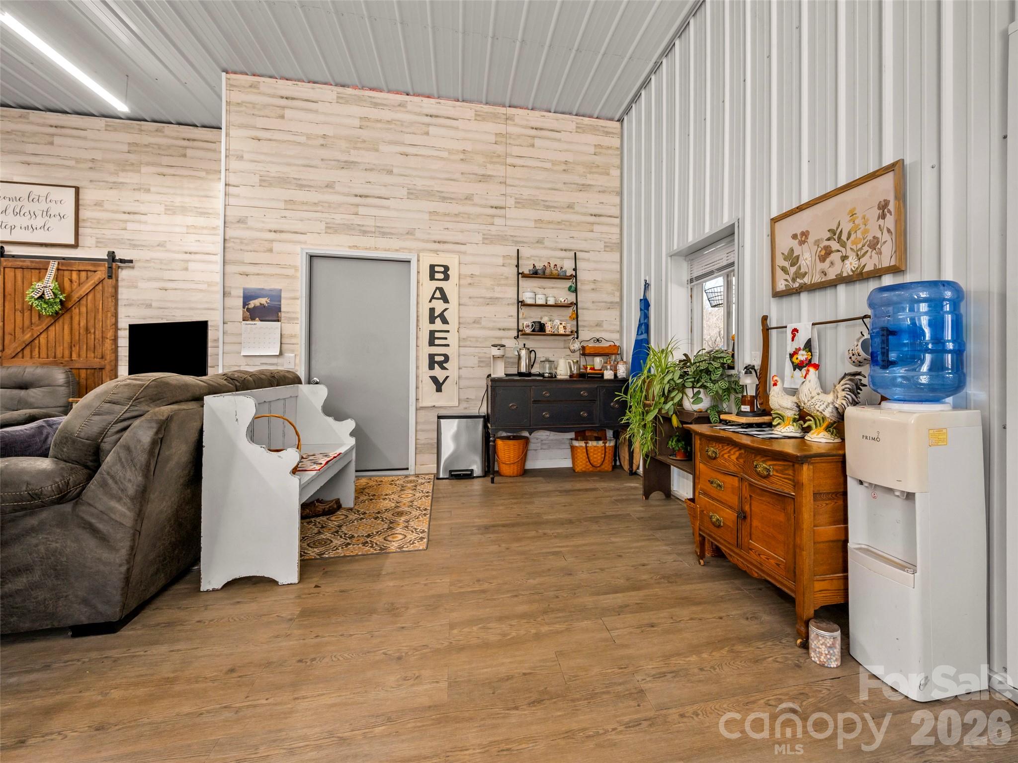 873 Ellenboro Henrietta Road Ellenboro, NC 28040 - Photo 9 of 48 a living room with furniture and a fireplace