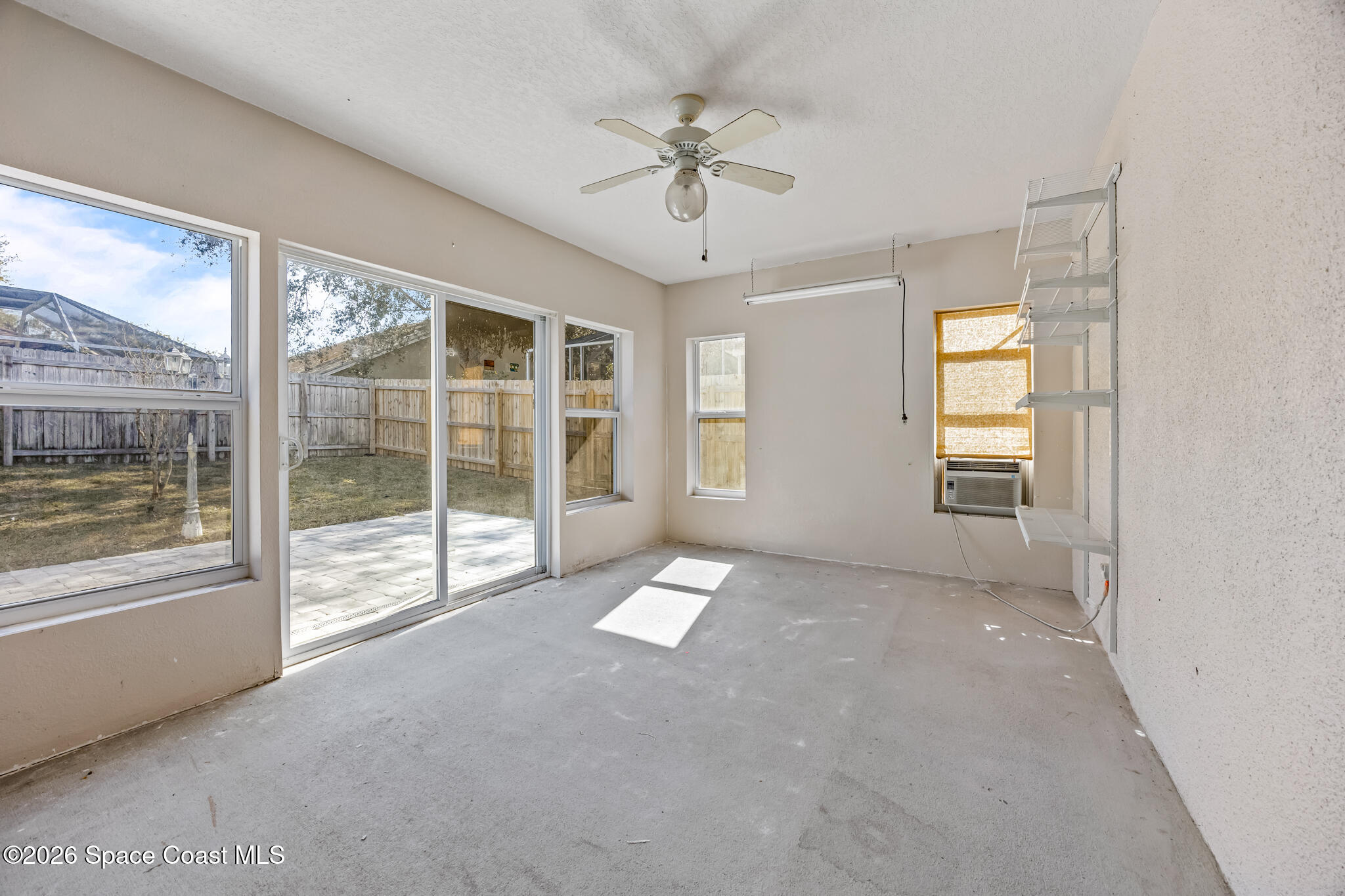 1915 Worchester Way Merritt Island, FL 32953 - Photo 21 of 27 a view of an empty room with a window