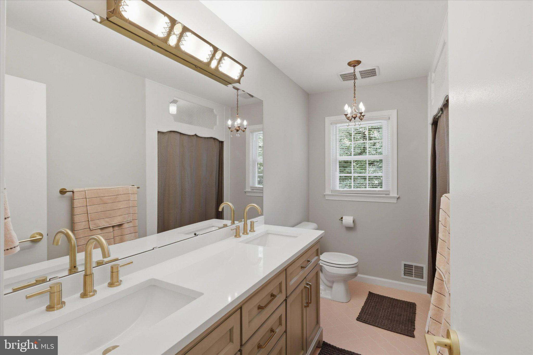 7007 Runnymeade Court Frederick, MD 21702 - Photo 20 of 37 Elegant bathroom with modern fixtures.