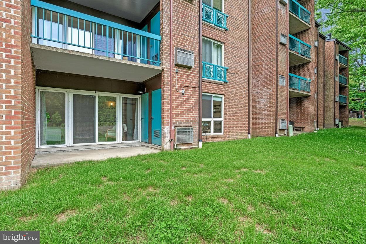 11804 Breton Court, Unit 1A Reston, VA 20191 - Photo 16 of 19 Charming patio in a serene setting.