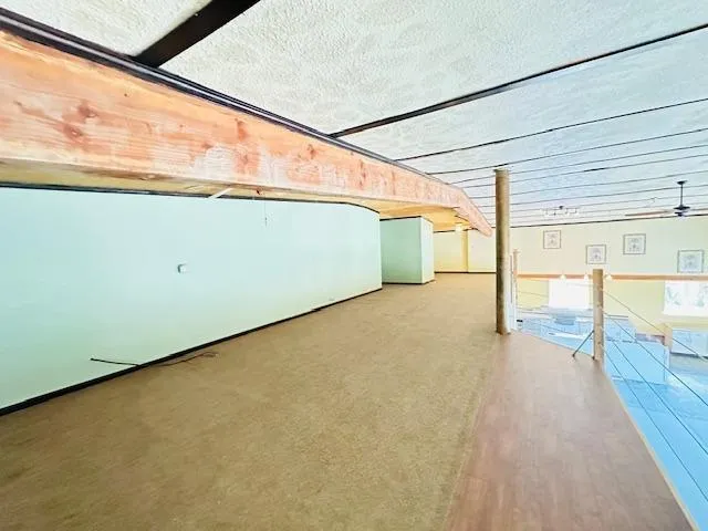 a view of a room with storage and utility room