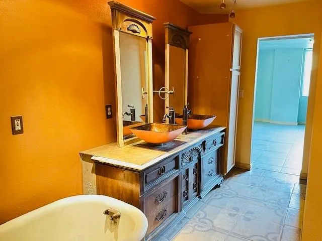 a view of a yard with large trees