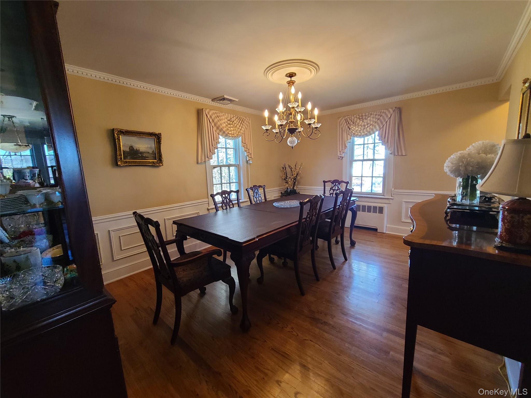 237 Best Road Swan Lake, NY 12783 - Photo 13 of 40 a view of a dining room with furniture and wooden floor