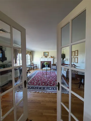 a living room with furniture and a table