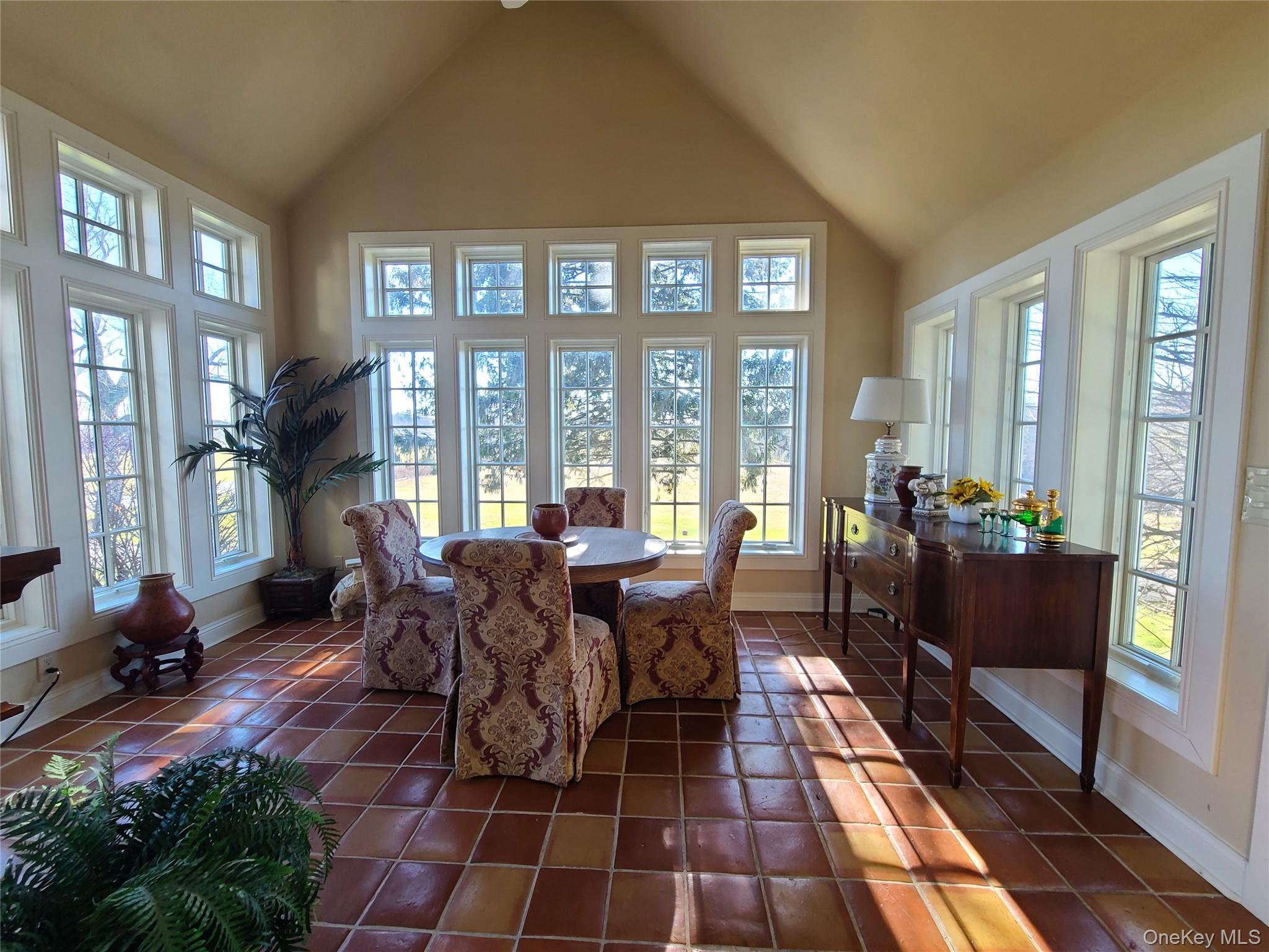 237 Best Road Swan Lake, NY 12783 - Photo 17 of 40 a living room with furniture and floor to ceiling windows