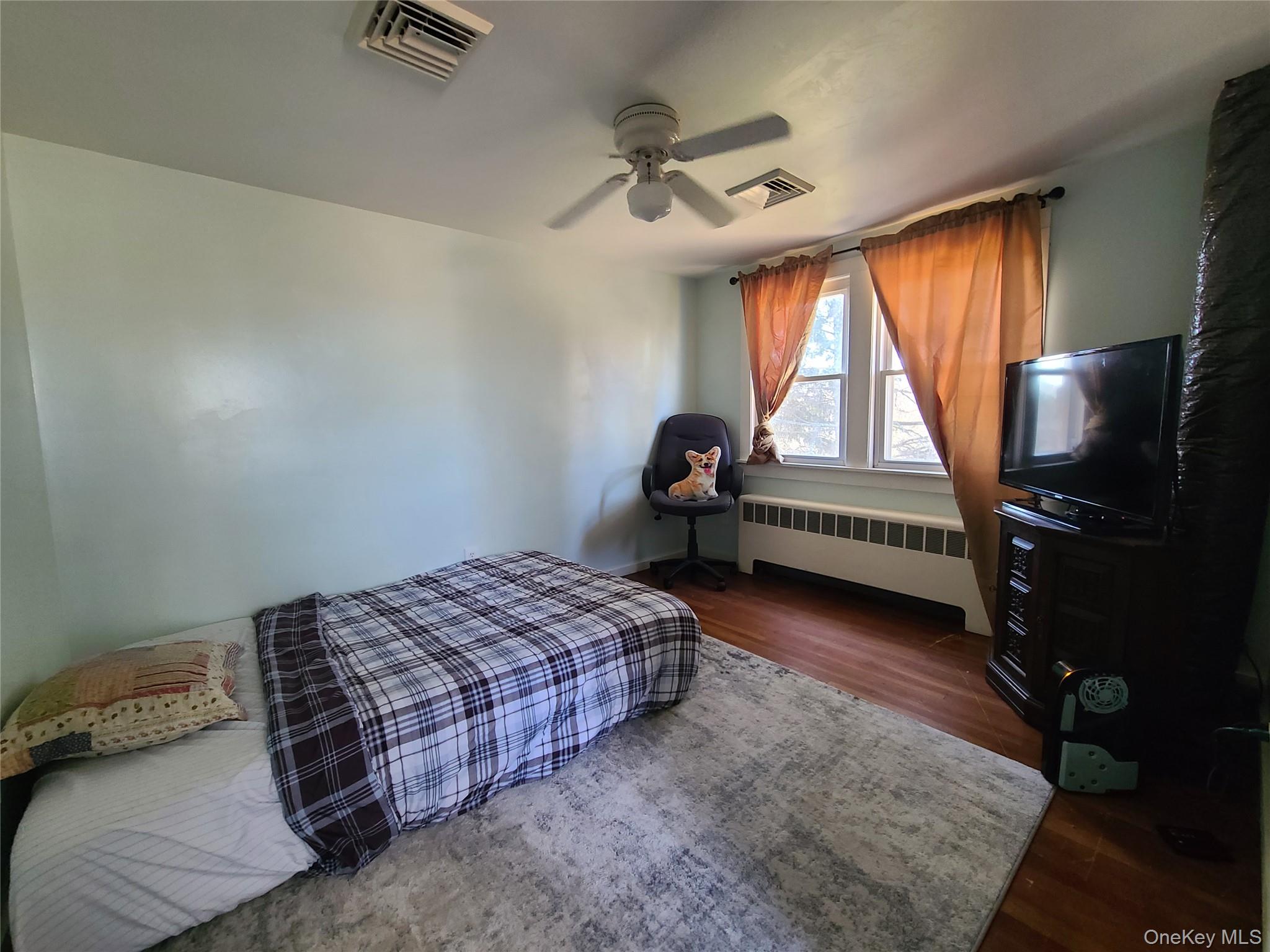 237 Best Road Swan Lake, NY 12783 - Photo 26 of 40 a bedroom with bed and a window