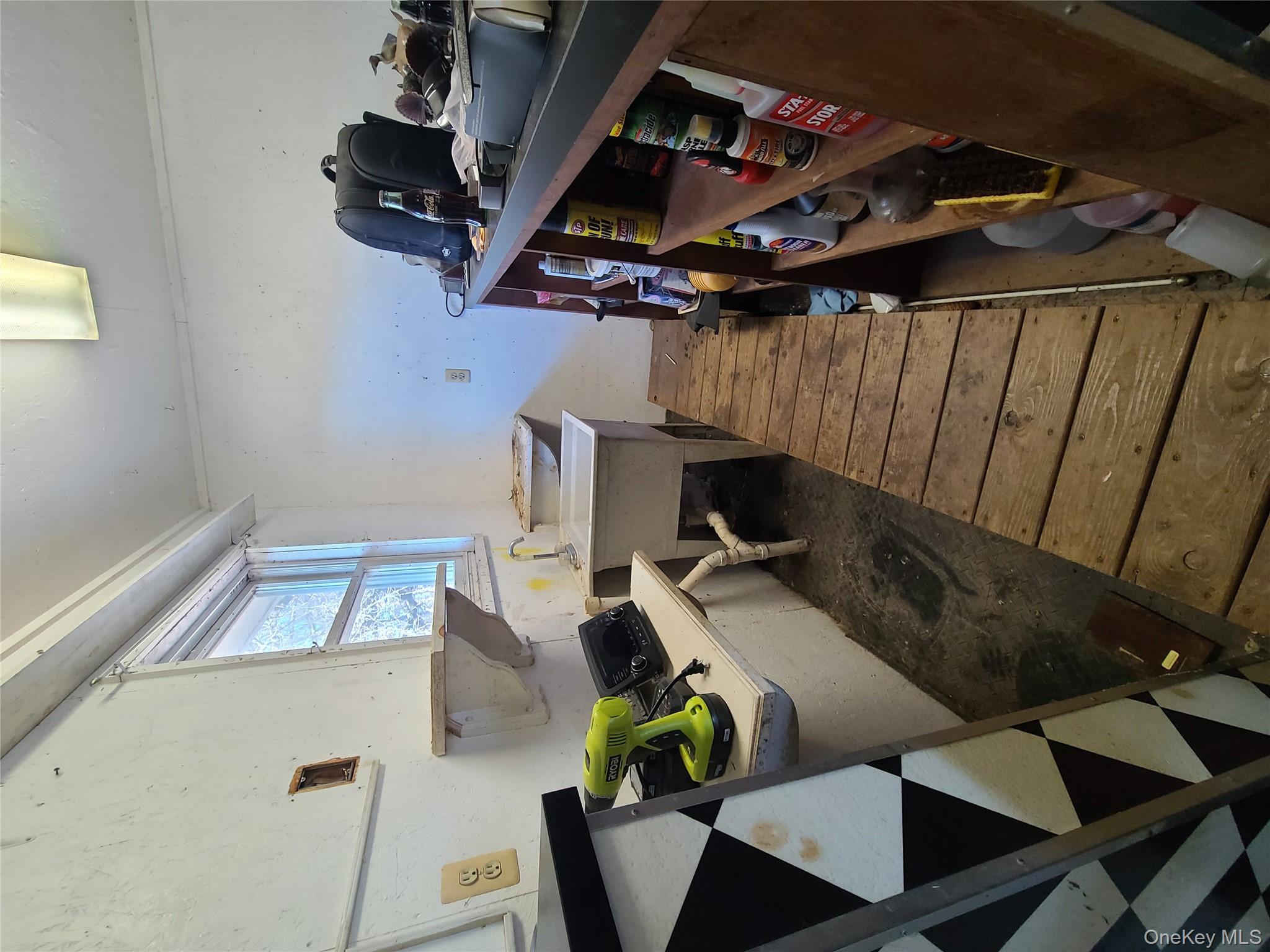 237 Best Road Swan Lake, NY 12783 - Photo 33 of 40 a living room with furniture a rug and a window