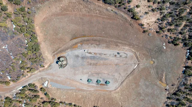 a view of a tree front of a house