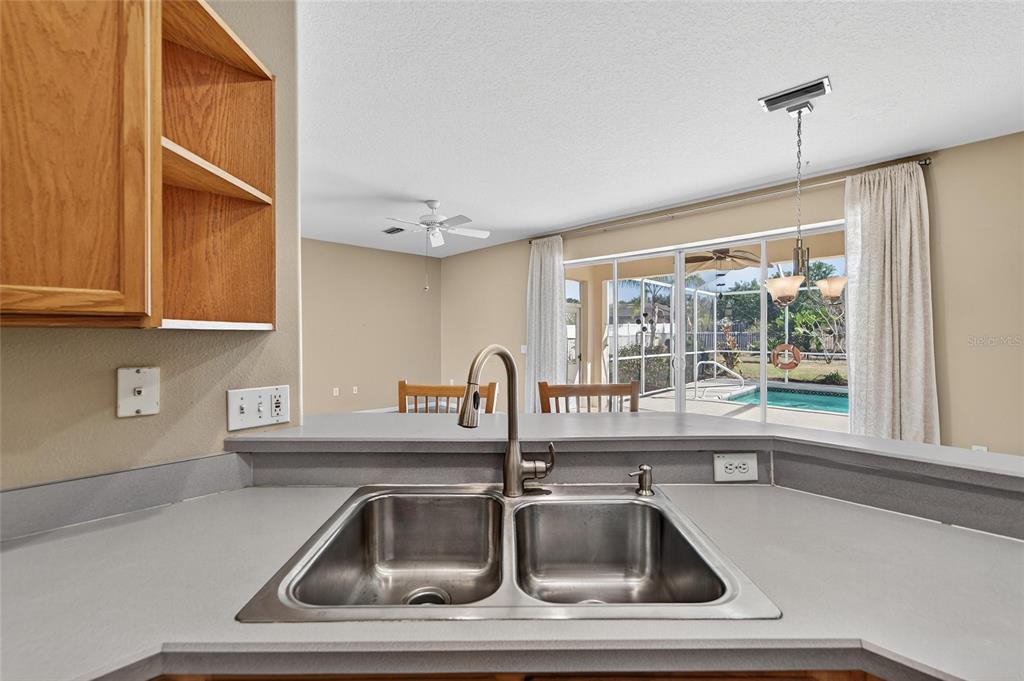 1615 Oracle Drive Ruskin, FL 33573 - Photo 29 of 87 a kitchen with a sink and a window