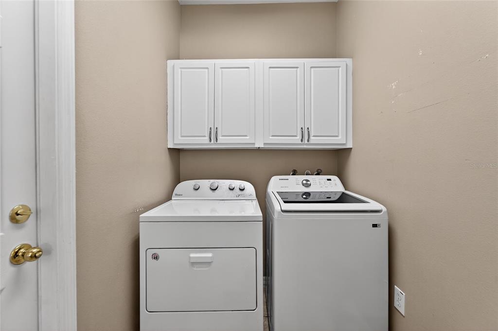 1615 Oracle Drive Ruskin, FL 33573 - Photo 34 of 87 a utility room with dryer and washer