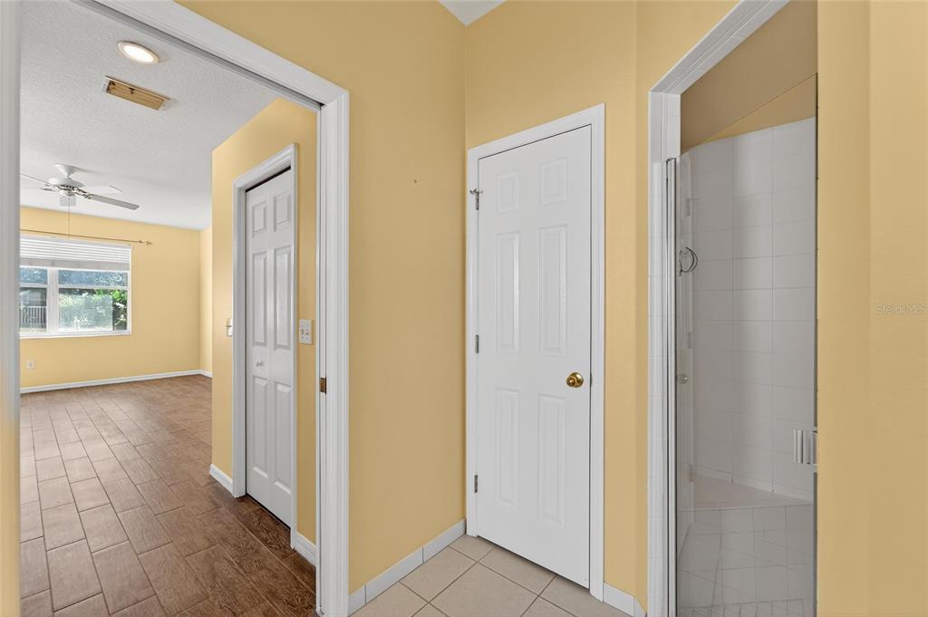 1615 Oracle Drive Ruskin, FL 33573 - Photo 42 of 87 a view of a bathroom with a glass door shower