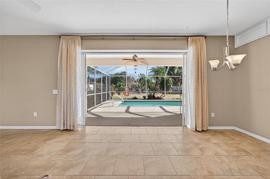 1615 Oracle Drive Ruskin, FL 33573 - Photo 58 of 87 a view of a glass door with a glass door