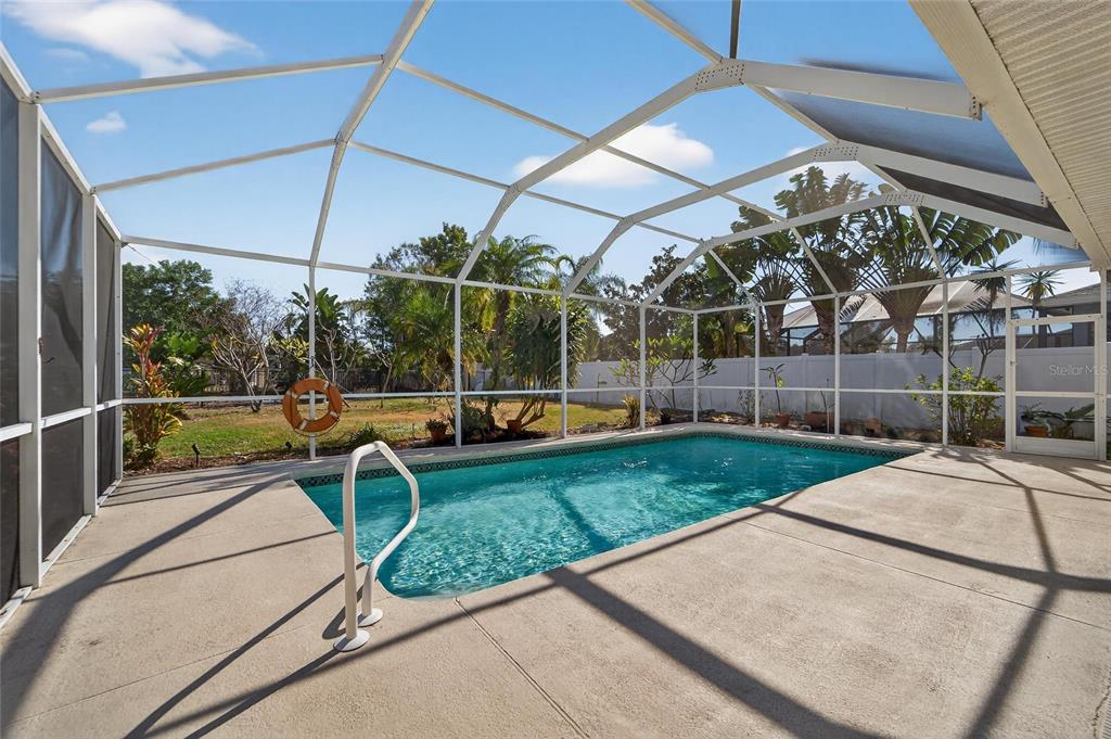 1615 Oracle Drive Ruskin, FL 33573 - Photo 62 of 87 a view of a backyard with swimming pool