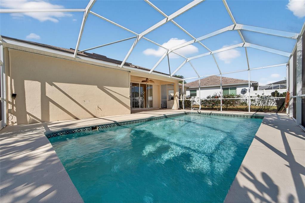 1615 Oracle Drive Ruskin, FL 33573 - Photo 64 of 87 a view of a house with a backyard