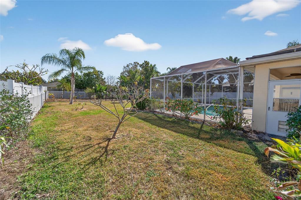 1615 Oracle Drive Ruskin, FL 33573 - Photo 67 of 87 a view of a house with backyard and sitting area