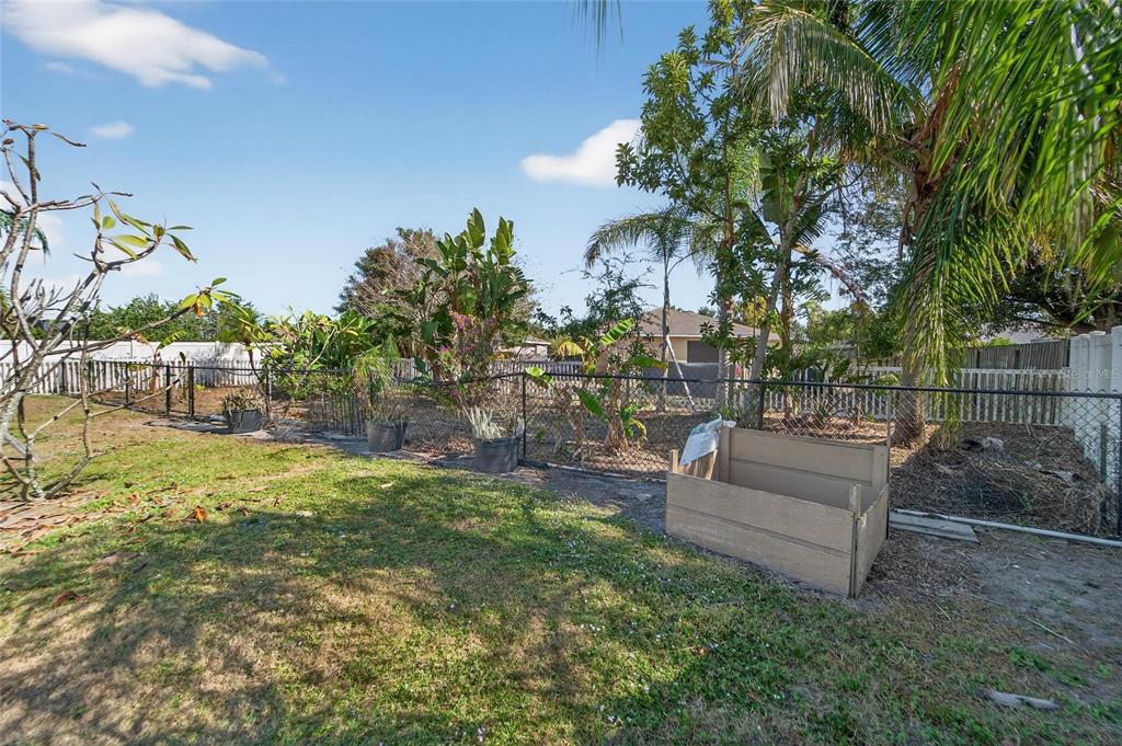 1615 Oracle Drive Ruskin, FL 33573 - Photo 74 of 87 a view of garden with patio