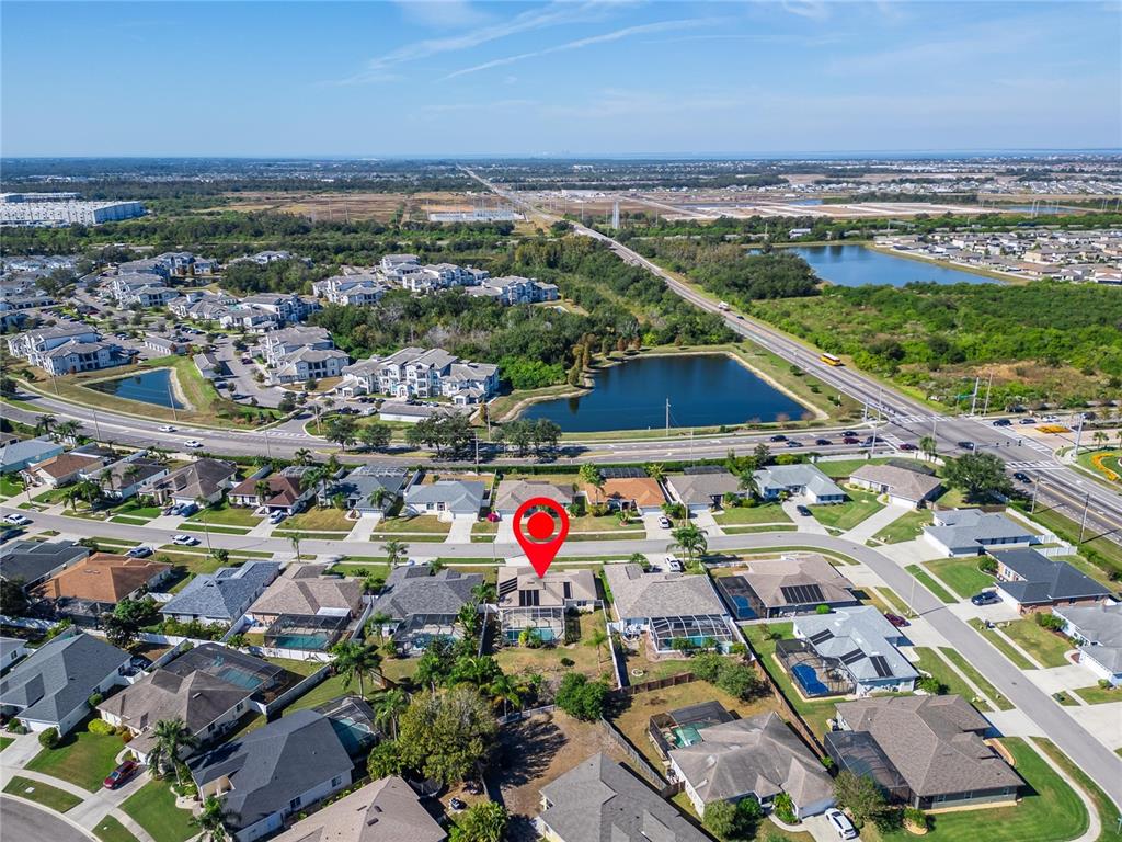 1615 Oracle Drive Ruskin, FL 33573 - Photo 81 of 87 an aerial view of residential houses with outdoor space
