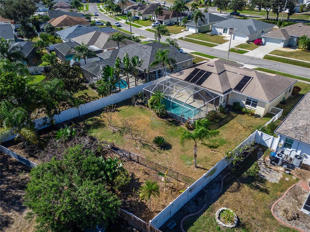 1615 Oracle Drive Ruskin, FL 33573 - Photo 83 of 87 an aerial view of a house with swimming pool and outdoor seating